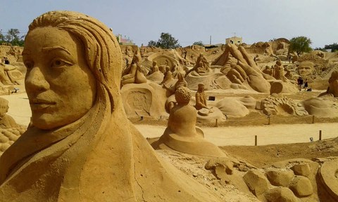 escultura arena pera